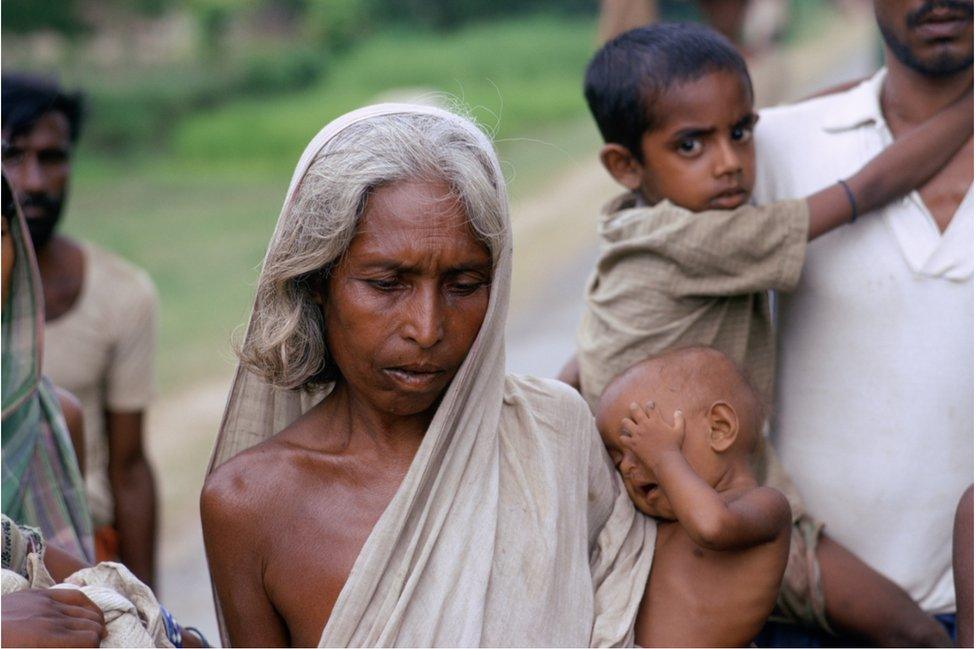 Woman and children at a refugee camp filled with East Pakistani refugees on the outskirts of Calcutta in India in 1971