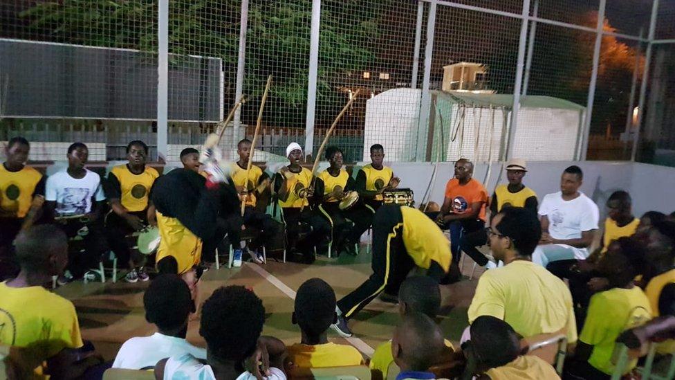 People practicing Capoeira Angola