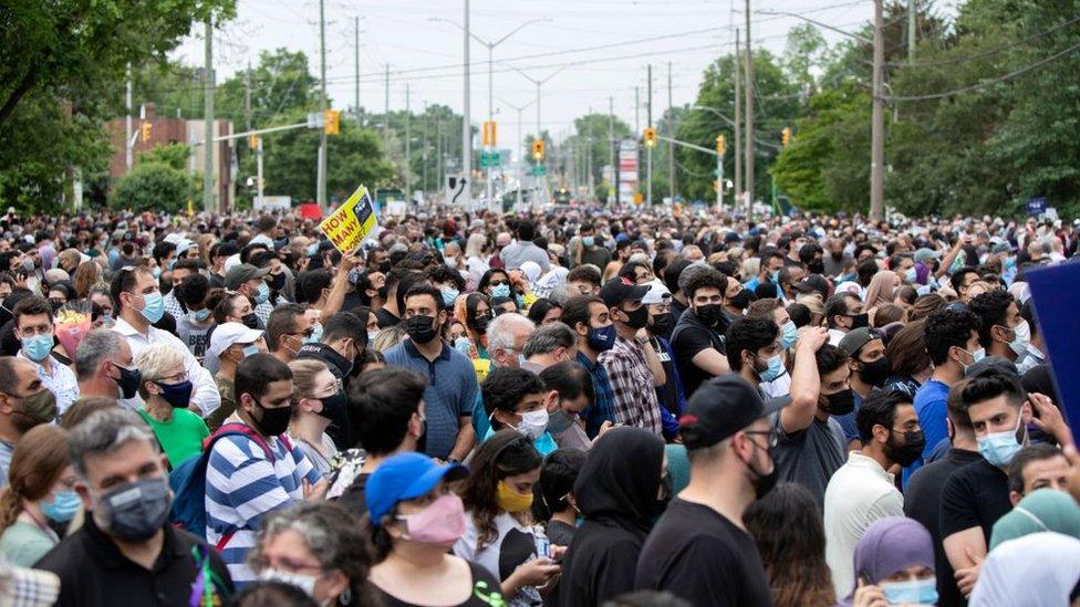 A crowd gathers at a London, Ontario vigil for the Afzaal-Salman family