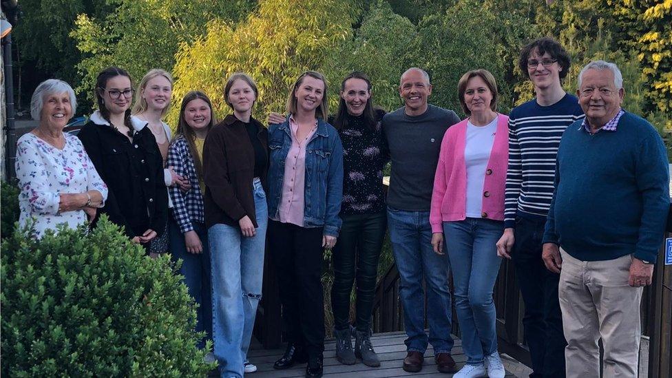 Catherine Hummel (centre, all black outfit) from Caernarfon with Luda Yatsiuk (to the left of Catherine, denim jacket & pink blouse,) Nataliiya Isaieva (pink cardigan, white top) from Ukraine, with their daughters and Catherine's parents