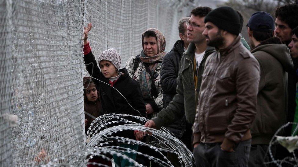 Refugee families queue to enter Macedonia at the Greek-Macedonia border in Idomeni. 3 March 2016