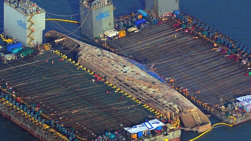 The sunken ferry Sewol is seen during its salvage operations at the sea off Jindo, South Korea (23 March 2017)