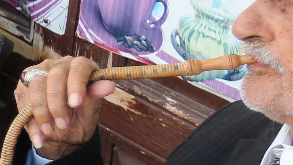 Shisha pipe being used by a man