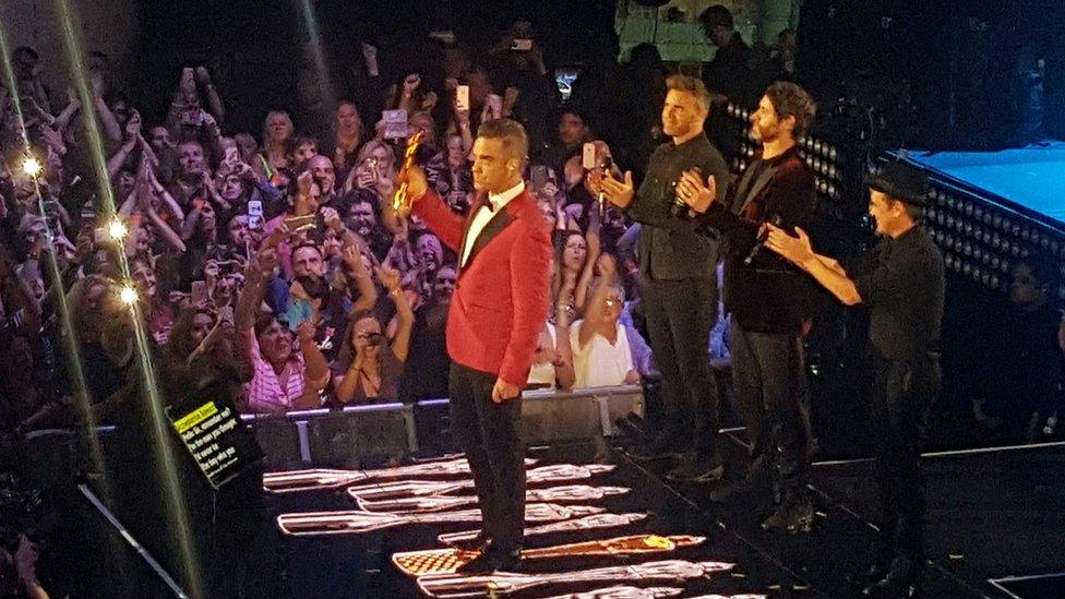 Robbie Williams and Take That on stage at the Troxy in London