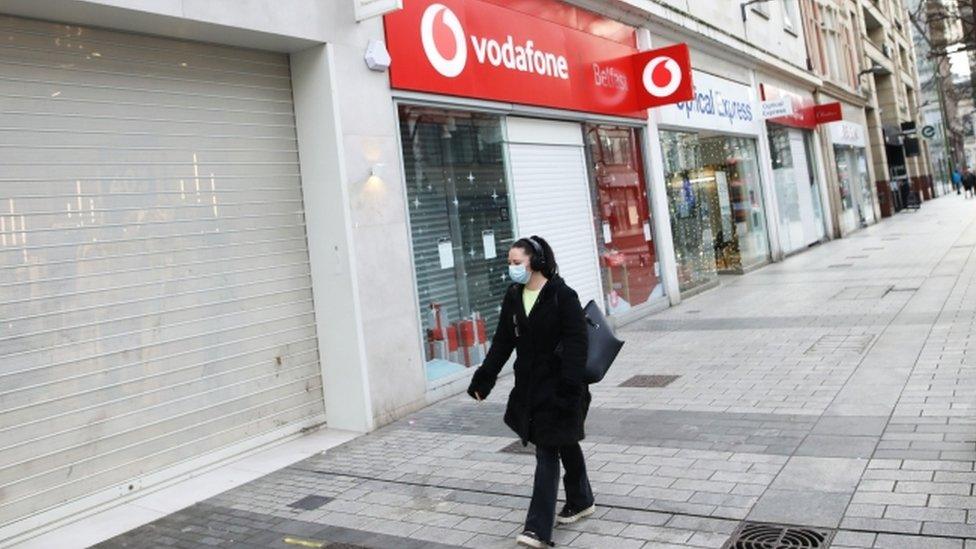 Woman walking in Belfast city centre