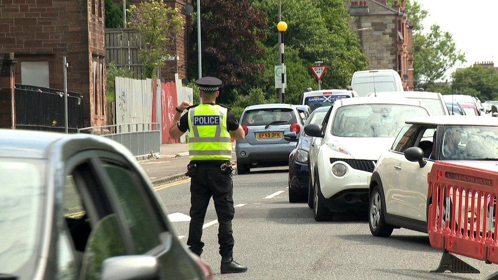 Police monitoring McDonald's queue