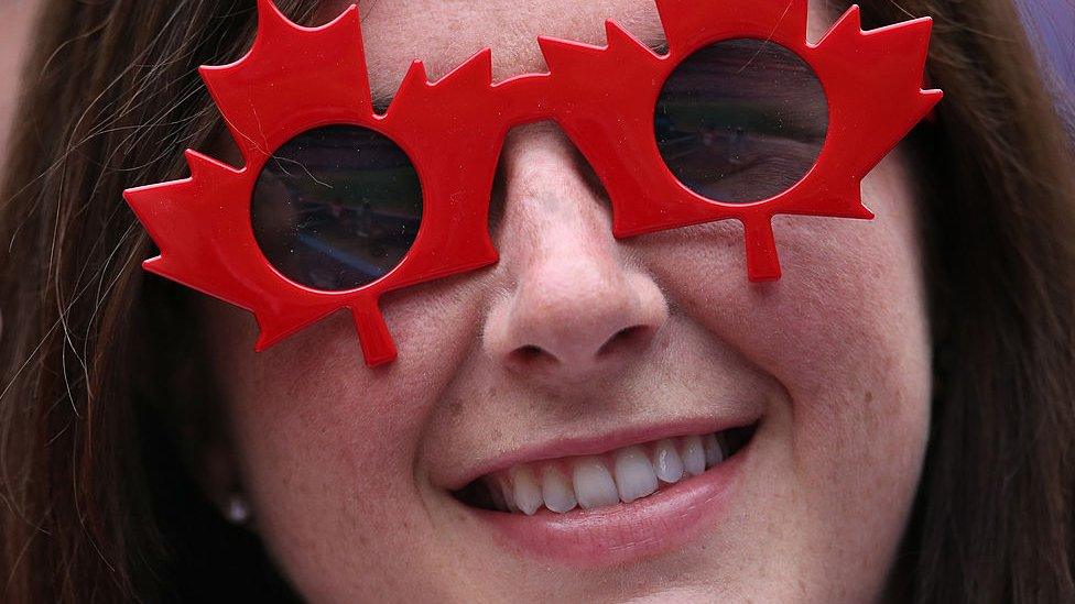 Woman with Canada glasses