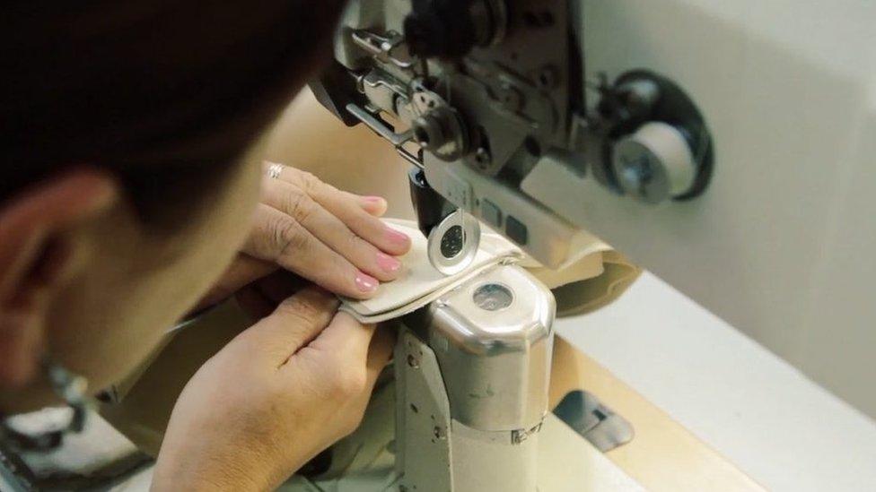 A worker at Luis' factory in northern Portugal