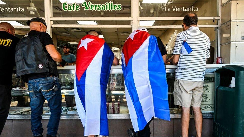 Customers order coffee in Miami