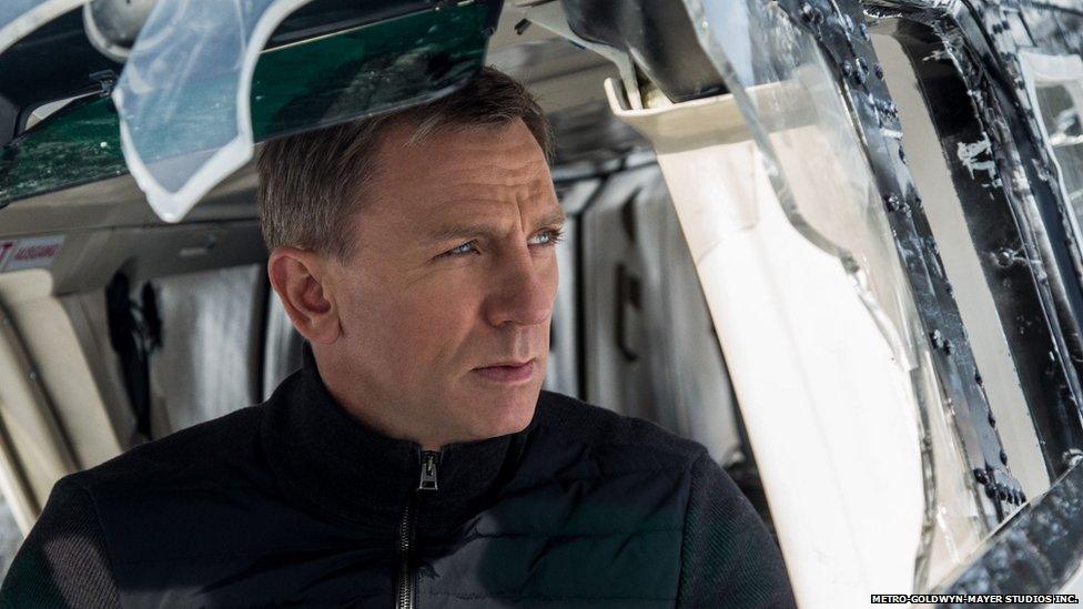 Daniel Craig as James Bond in a scene involving a helicopter crash from the latest film in the franchise, Spectre