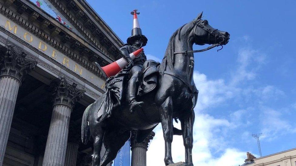 A cone with a black lower half and a propeller on top appeared after the closure of Banksy's exhibition at Glasgow's Gallery of Modern Art