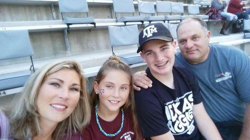 Officer John Barnes (R) with family