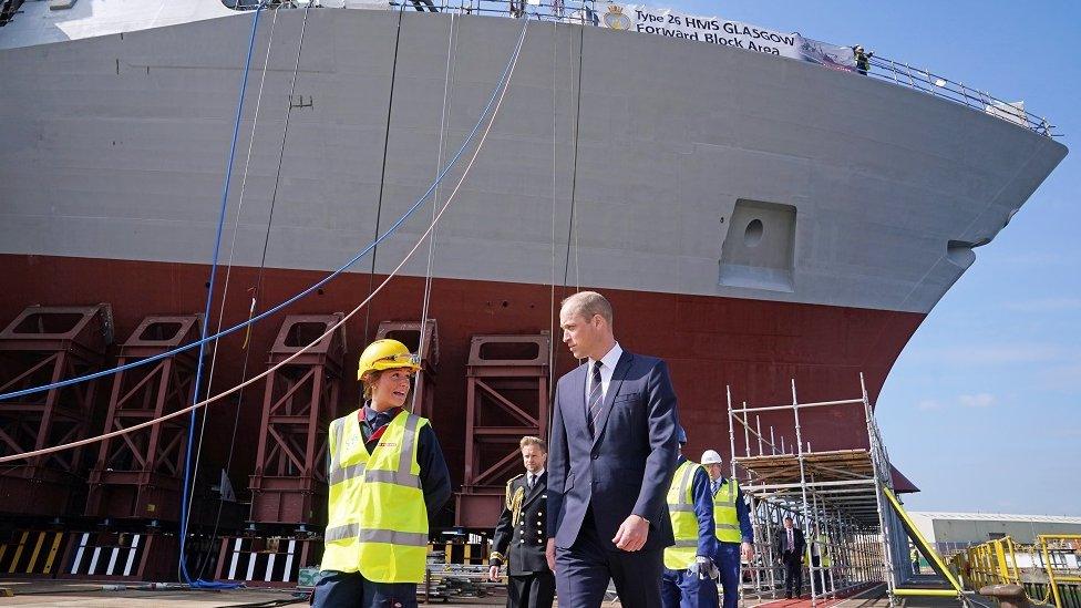 Prince William and apprentice in front of ship