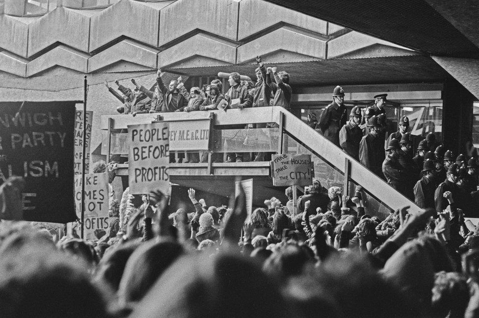 Black and white photo of protesters occupying the Centre Point building on 20 January 1974