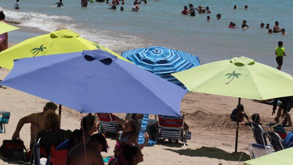 Holidaymakers on a beach