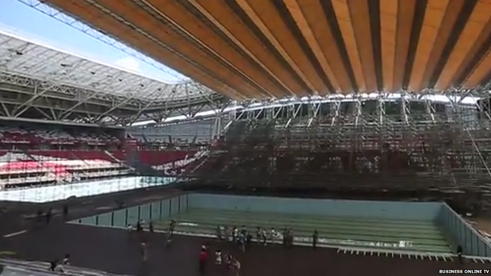 A view of the new swimming pools on the pitch and the temporary roof