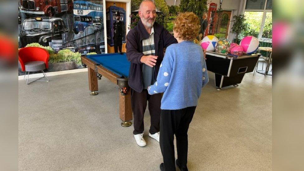 Stefan greets Norma at Endike Community Centre, Hull