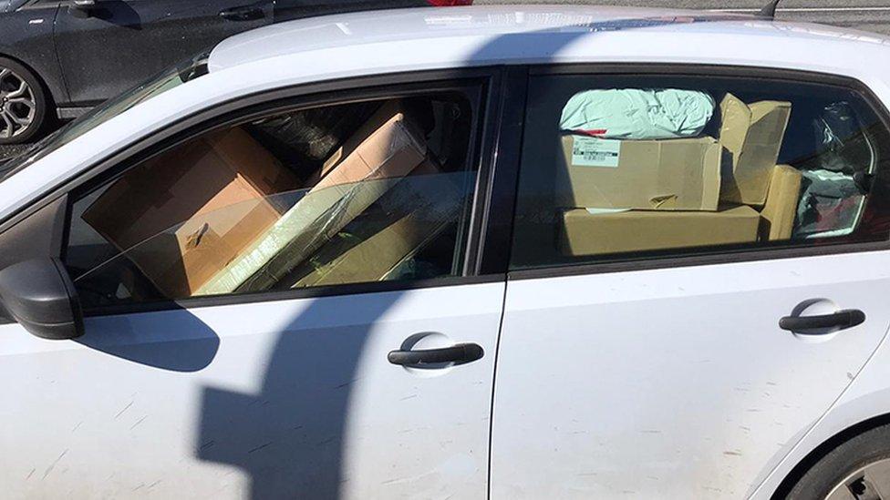 Car overloaded with parcels