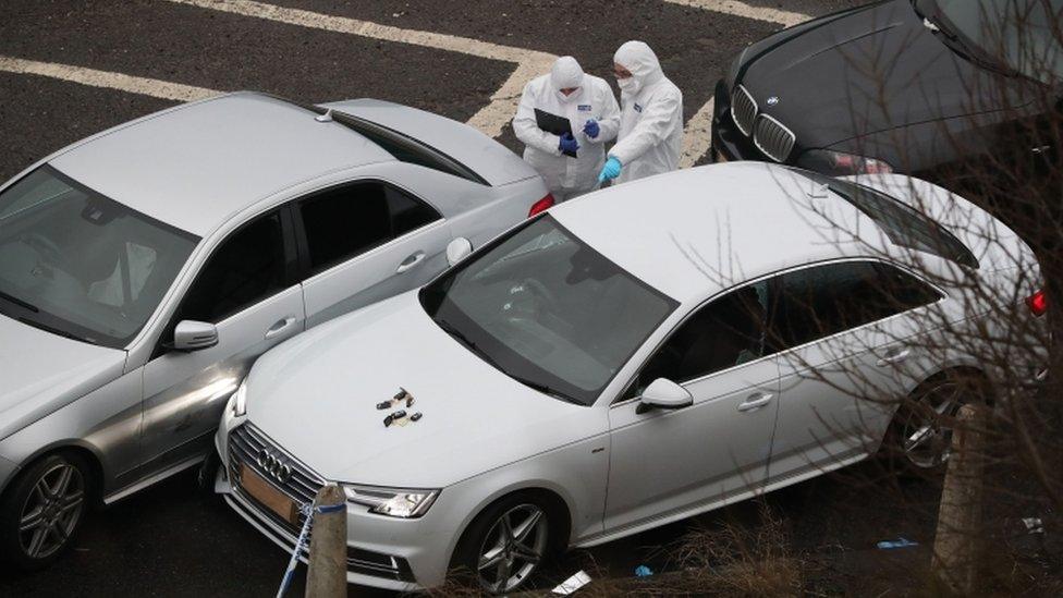 Police forensics officers at the scene near J24 of the M62