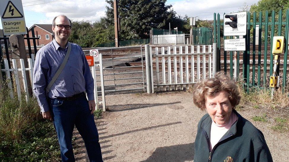 Copmanthorpe parish councillor Lars Kramm and Bishopthorpe parish councillor Carole Green at the current level crossing