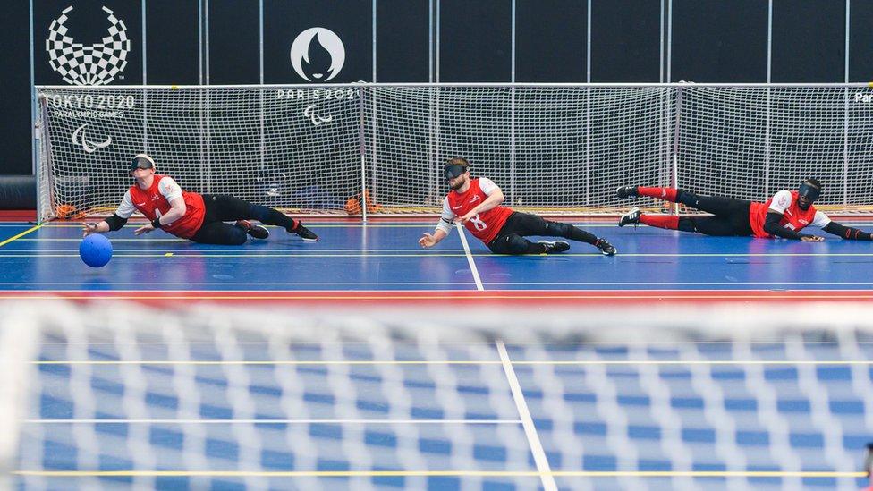 Athletes playing Goalball