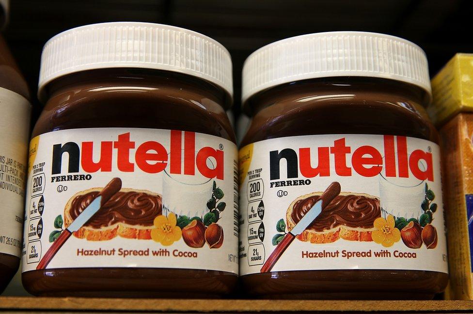 This picture shows jars of Nutella on a shelf at a market in San Francisco, California, on August 18, 2014