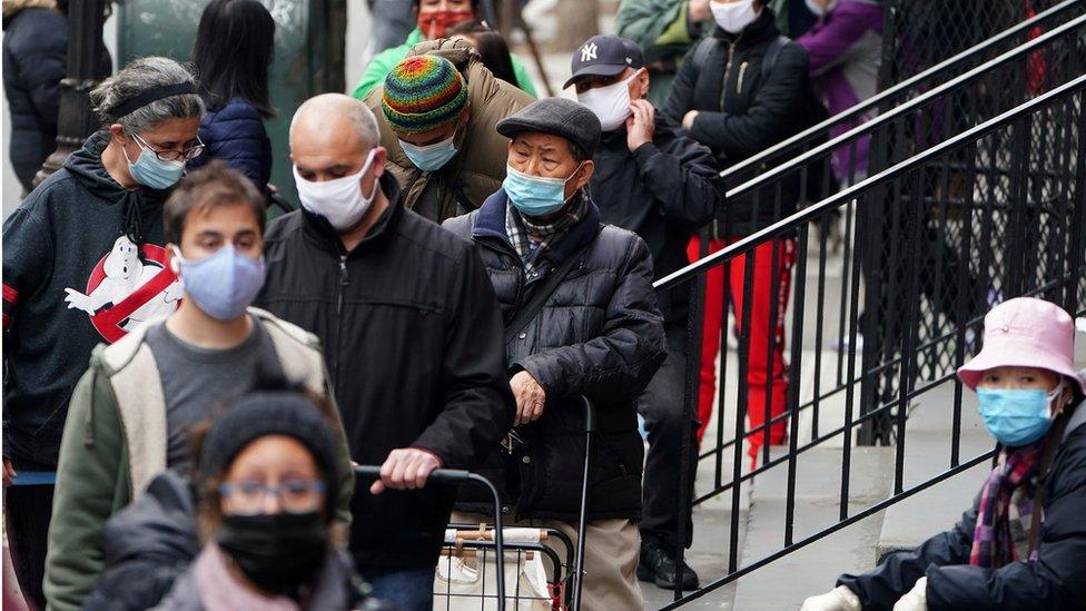 people line up for a food pantry in New York