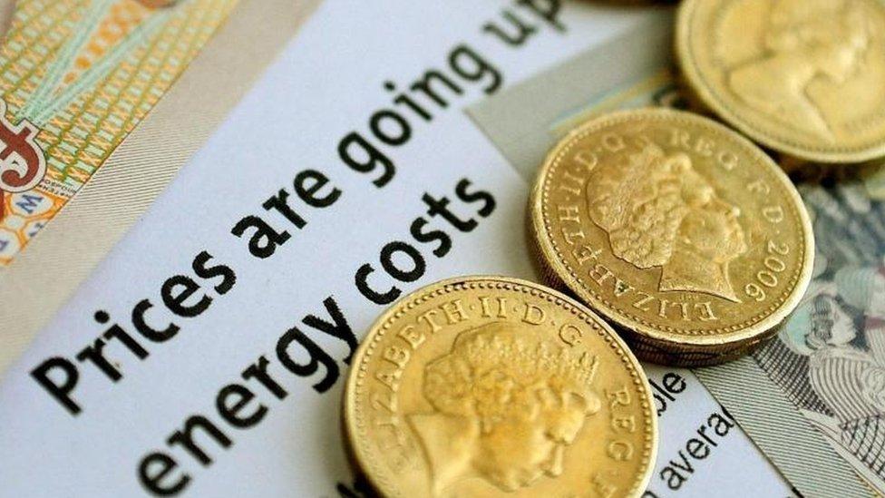 Energy headline and coins