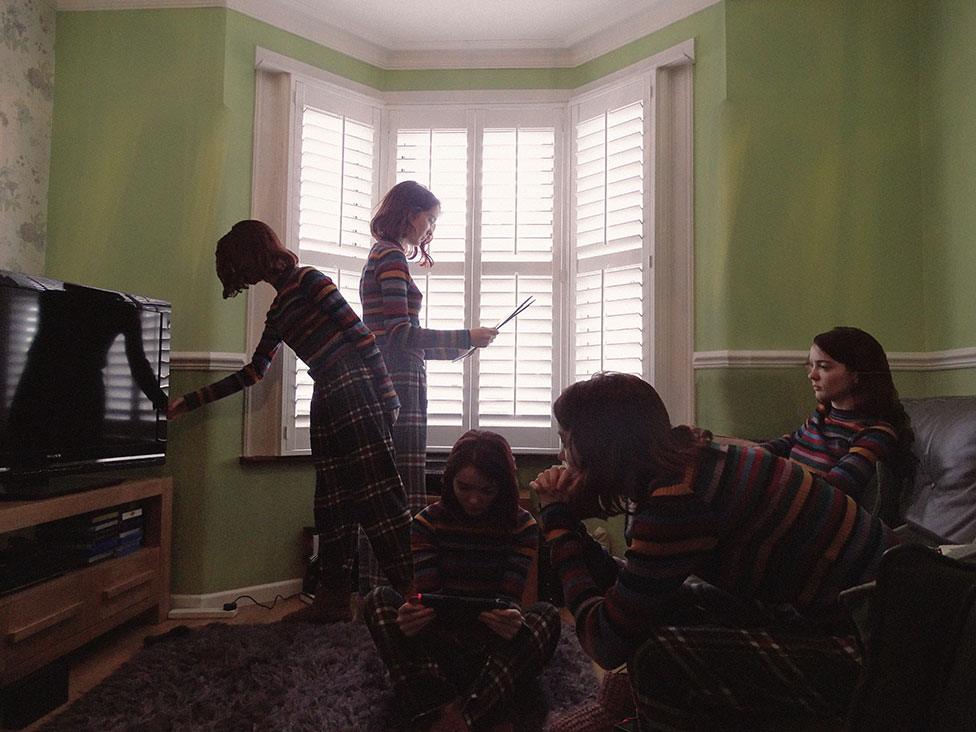 A montage of a young woman in different positions around her living room