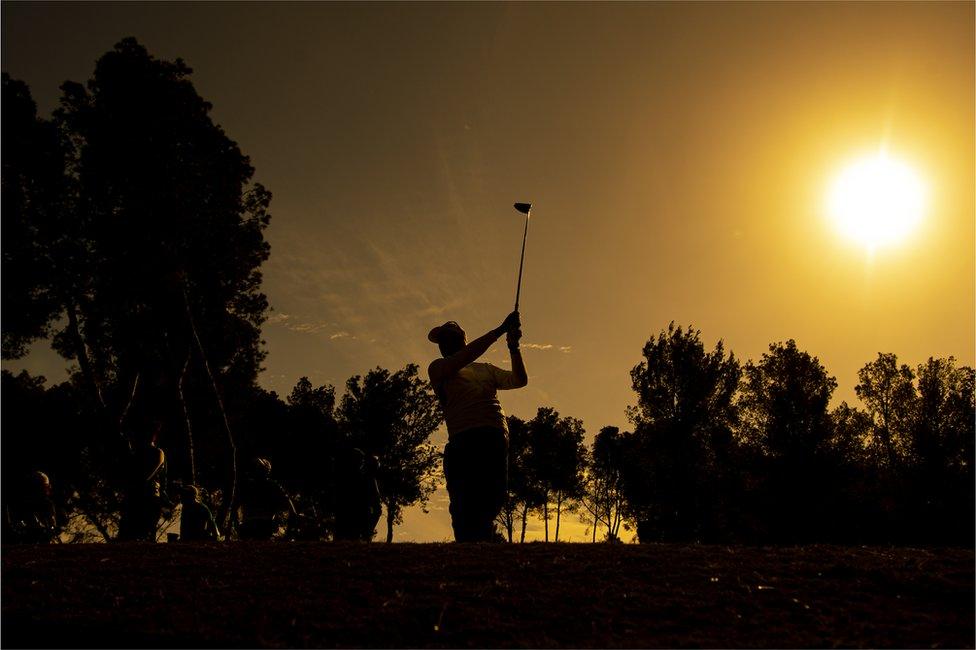 Jacques Blaauw of South Africa plays his tee shot on the 8th hole.