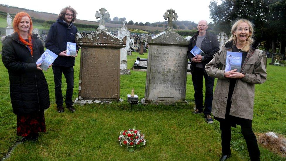 Rosemary and members of her family at Molly's graveside in St Finlough's church