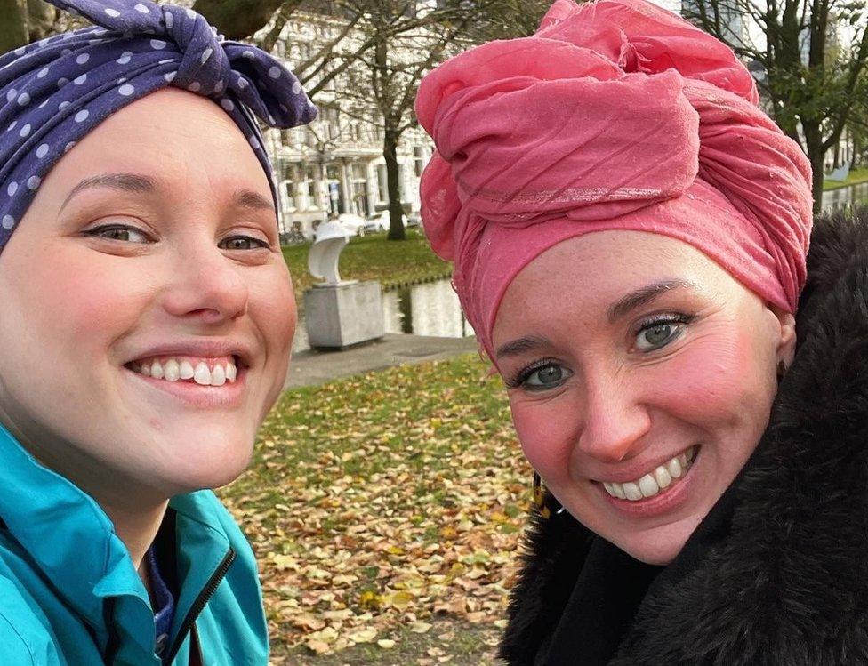 Laura and her friend in bandanas