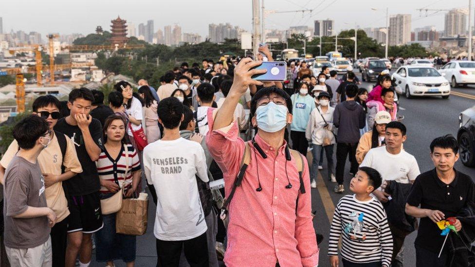 Visitors on the Yangtze River bridge in Wuhan