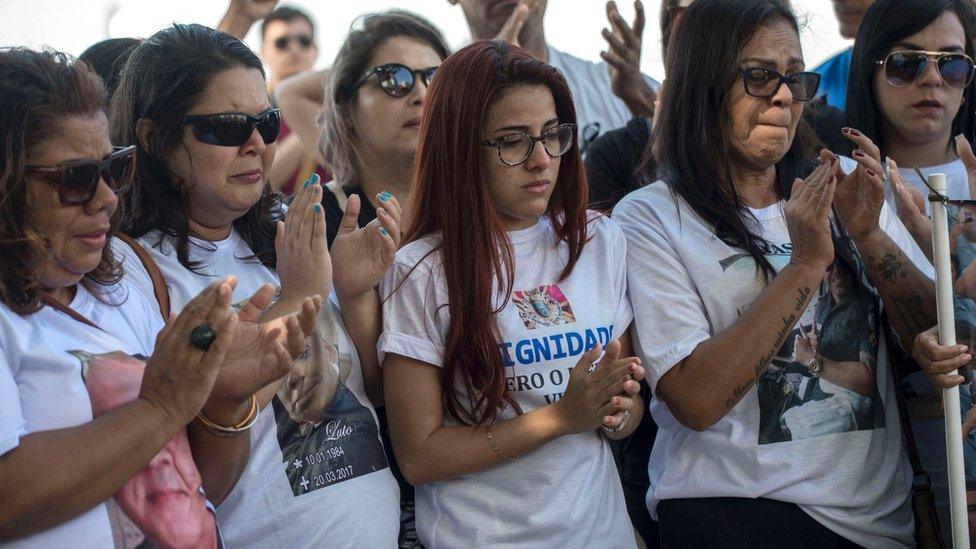 tearful women protesting