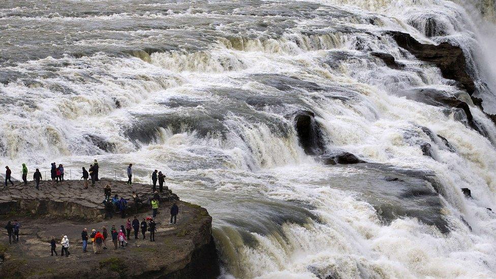 Tourists at the Gullfoss waterfall in Iceland