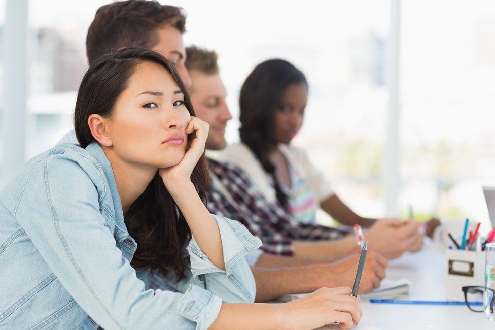 Bored woman in meeting