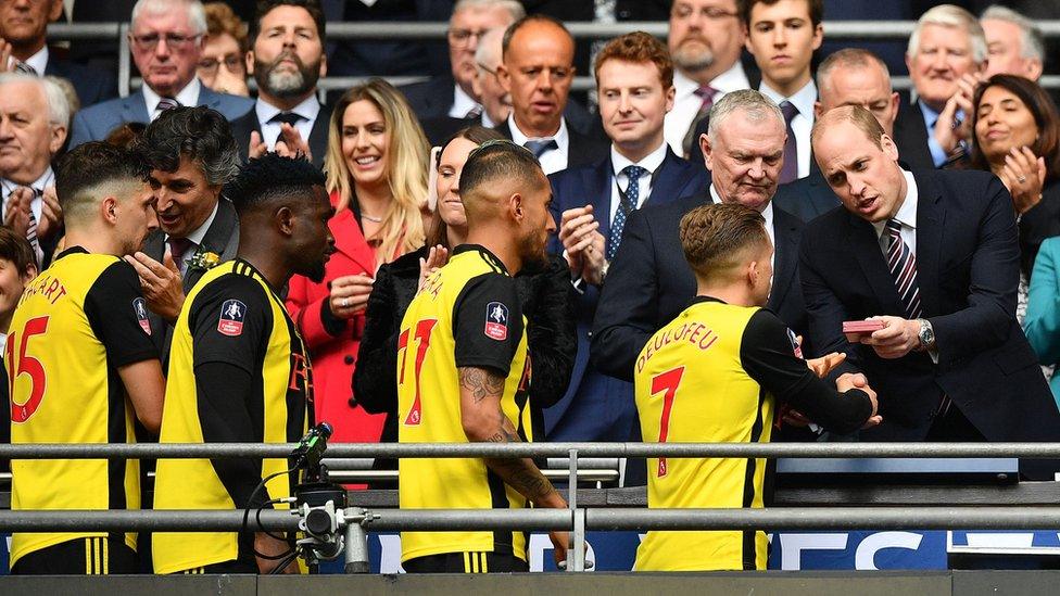 Watford collect their runners up medals from Prince William.