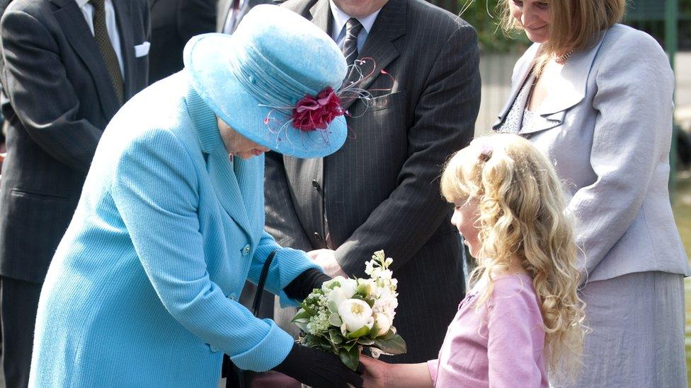 Sophie Bellringer presents flowers to the Queen in 2010