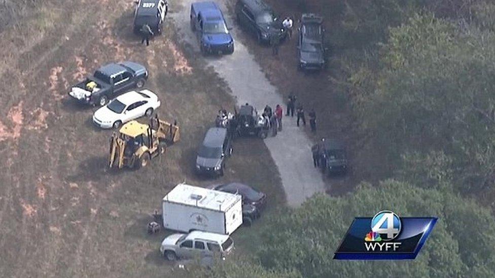 Police officers searching the property in Woodruff, South Carolina