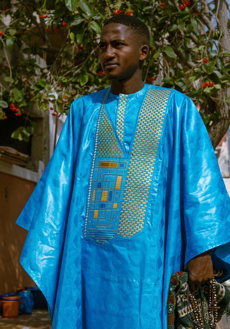 Boubacar Diallo wears a blue boubou