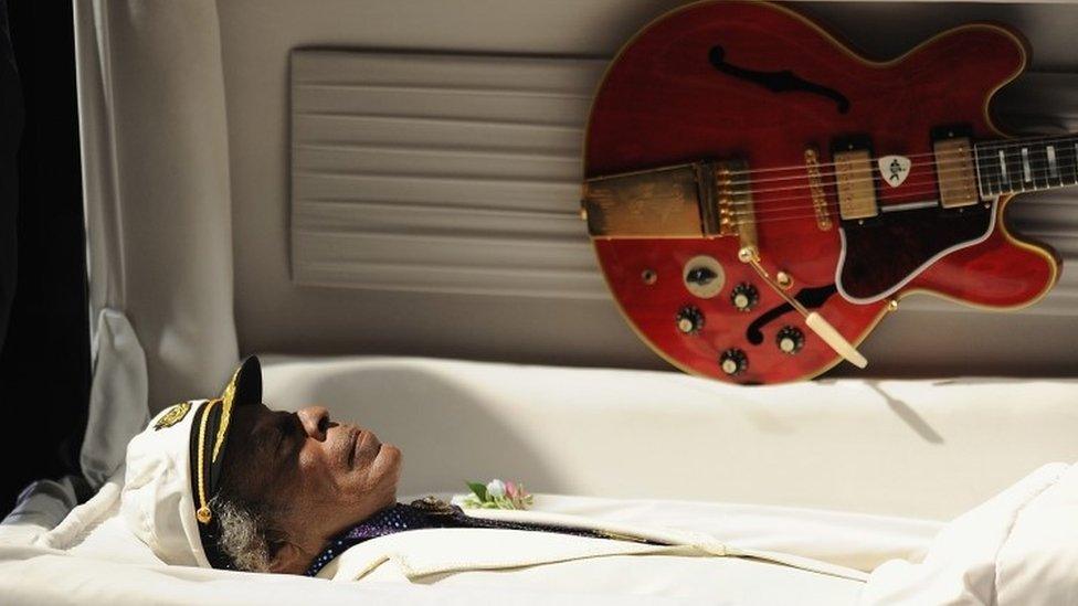 The body of Chuck Berry lies in his casket during a public memorial service for the rock 'n' roll legend at the Pageant Concert Hall and Nightclub (09 April 2017)