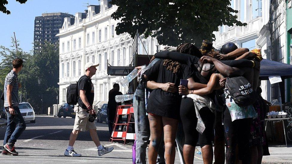 Prayers are held near Grenfell Tower