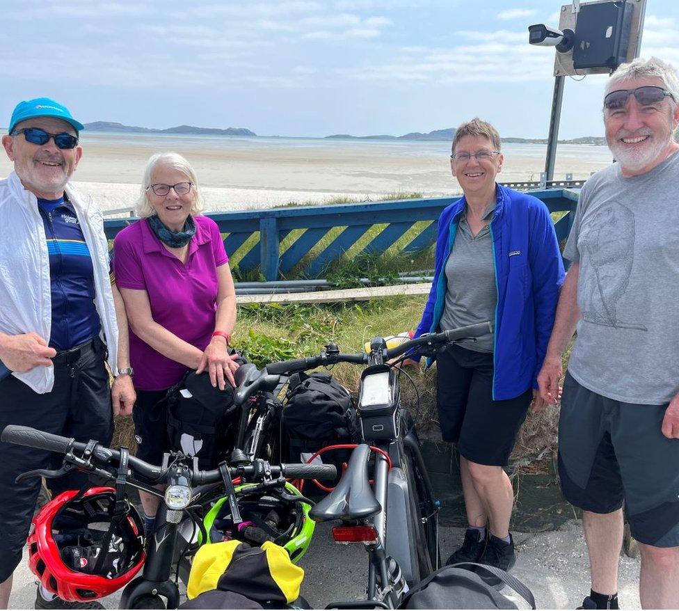 cyclists at the beach in Barra