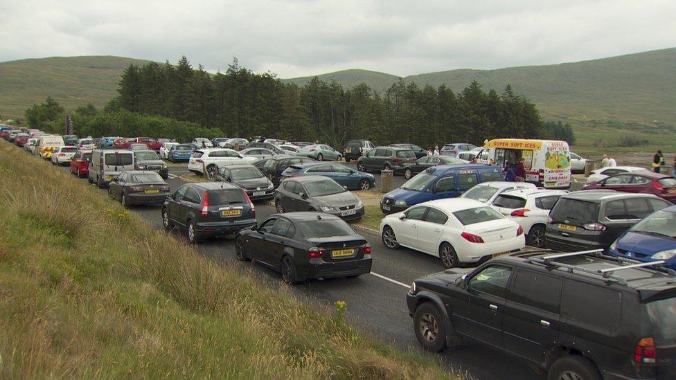 Dozens of cars at Spelga Reservoir