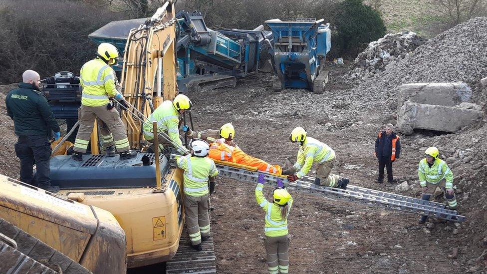 Overturned digger