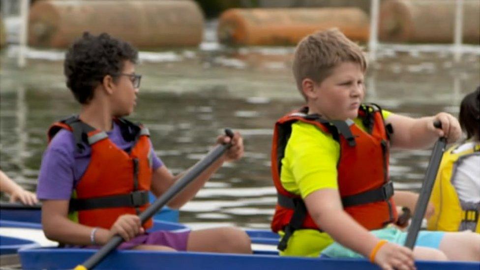 Children paddling