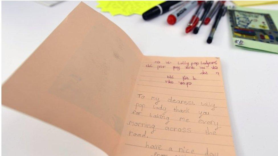 Child writes message to their lollipop lady