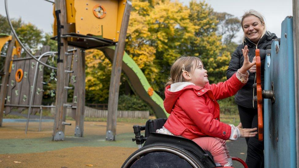 child-using-a-wheelchair-at-play-area.