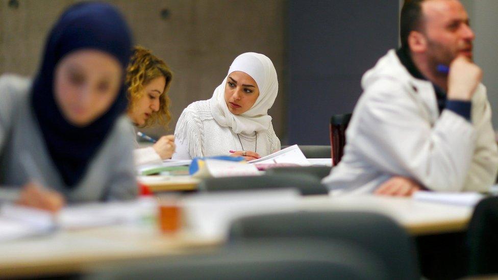 Migrants who work as teachers in their home countries participate in programme to help them teach in German schools, at the University of Potsdam on 14 April 2016