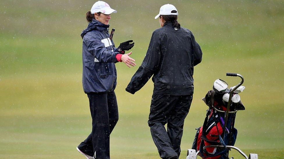 Women finish their round of golf at Muirfield Golf Club on May 19, 2016 in Gullane, Scotland